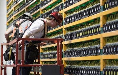 A sprawling mining farm powered by solar panels, exemplifying the integration of renewable energy into large-scale mining operations.